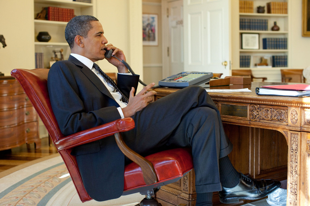 President Barack Obama talks on the phone. Jan. 15, 2010 (Pete Souza/Wikimedia Commons)