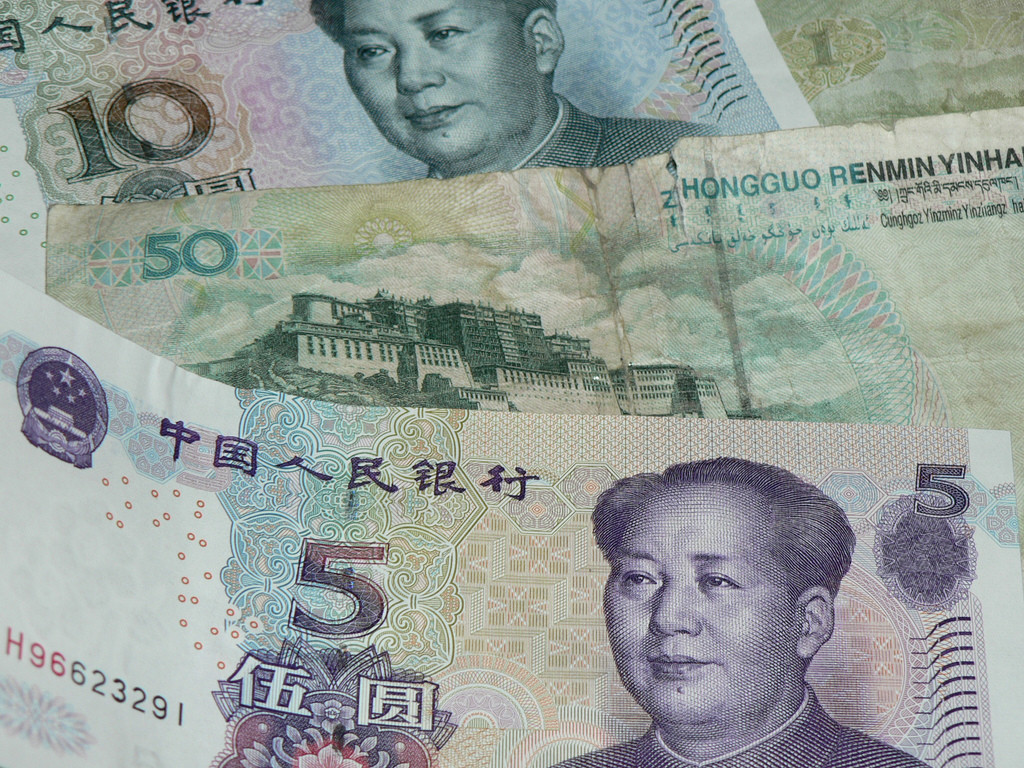 A picture of the Chinese 5, 10 and 50 yuan bills. On average (over the past 5 years), 1 US dollar has equaled between 6 and 7 Chinese yuan. (Christina B. Castro/ Flickr Creative Commons).