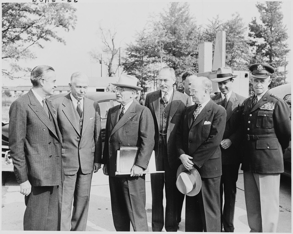 Truman with Achenson and other advisers (Wikimedia Commons).