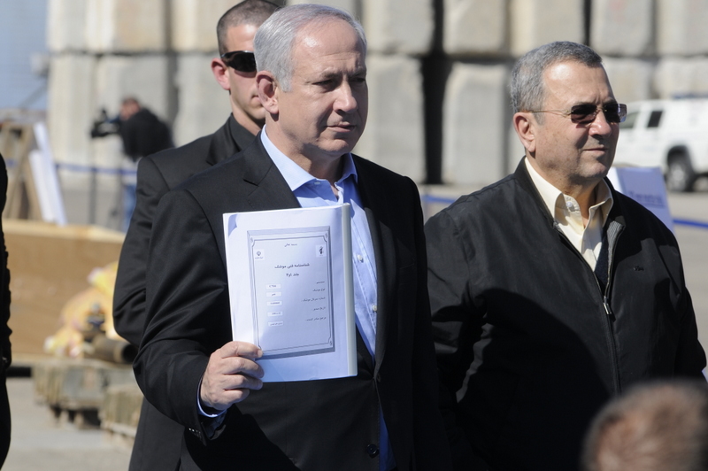 Prime Minister Benjamin Netanyahu and Defense Minister, Ehud Barak hold an Iranian instruction manual for the C-704 anti-ship missile. March 16, 2011. (Israel Defense Forces/Flickr Creative Commons)