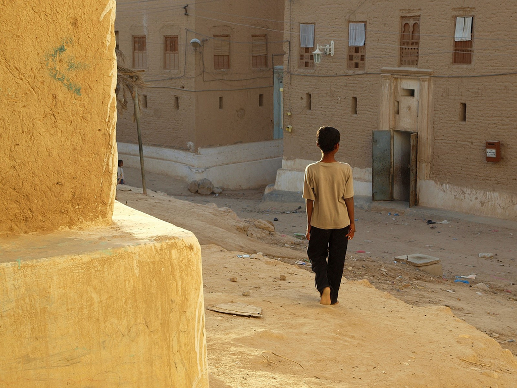 A boy gazes into the distance in the backstreet of Shibam, Yemen, located 300 miles east of Sana’a. (Martin Sojka/Creative Commons)