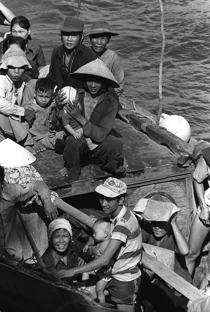 Refugees from Vietnam escaped on small and crowded fishing boats. May 1984. (Lt. Carl R. Begy/Wikimedia Commons)