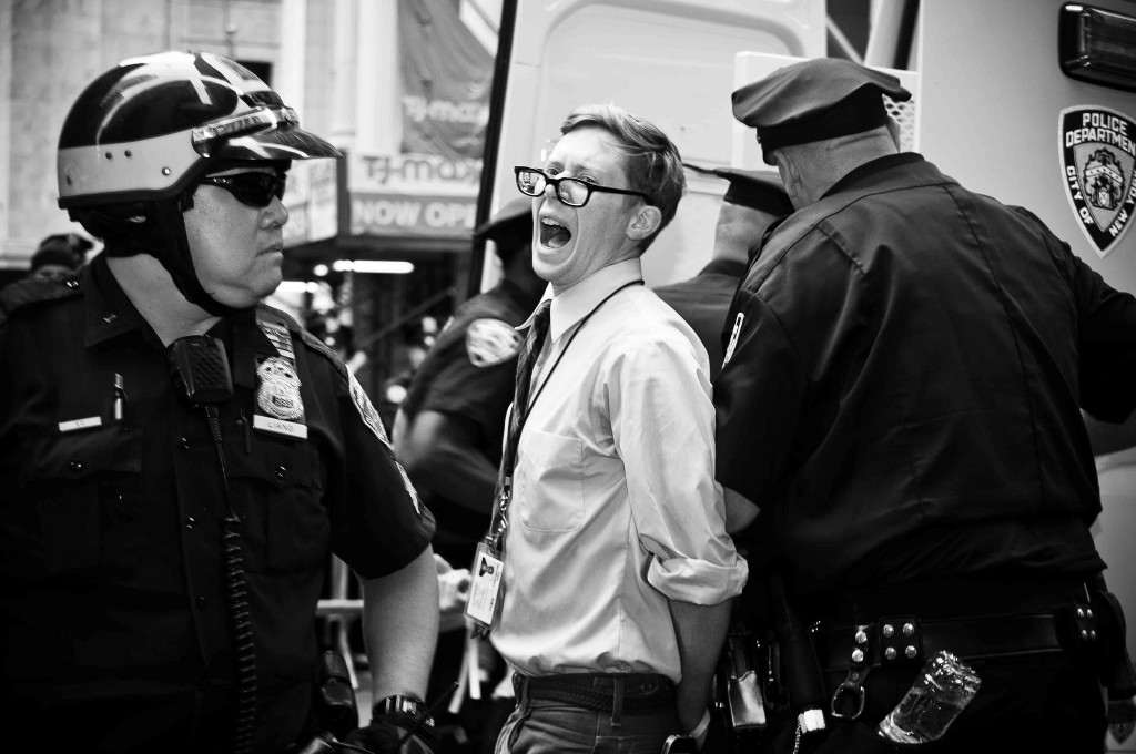 Journalist John Knefel is arrested by the NYPD during an Occupy Wall Street protest in 2012. (Glenn Halog, Flickr Creative Commons).