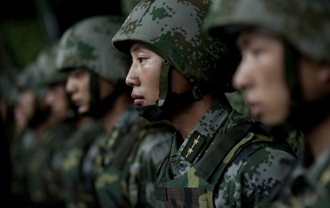 Chinese soldiers prepare for a military demonstration in July 2011. (Times Asi/Flickr CC).