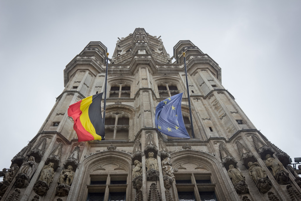 Belgian and European Union flag at half-mast at Grand Place. March 23, 2016. (Valentina Cala/Flickr CC).