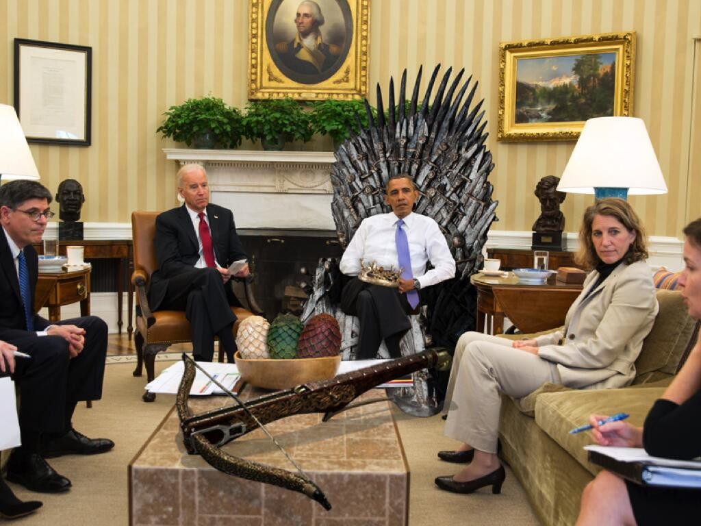 President Obama meets with other government officials in the Oval Office, edited to appear as if he is sitting on the Iron Throne from Game of Thrones. May 4, 2014. (Unidentified White House Staff/Wikimedia Commons)