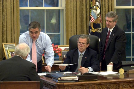 Tenet and Bush in the Oval Office (Wikimedia Commons)