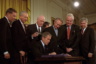 George W. Bush signing the Patriot Act. October 10, 2001. (Office of Management and Administration. Office of White House Management. Photography Office./Wikimedia Commons)